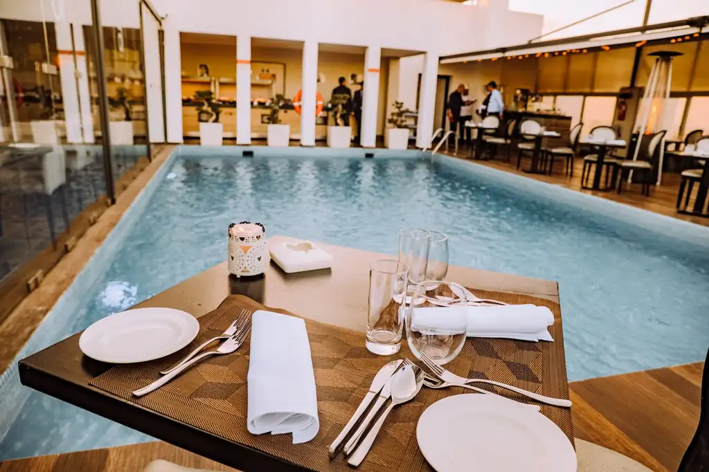 Elegant poolside dining setup