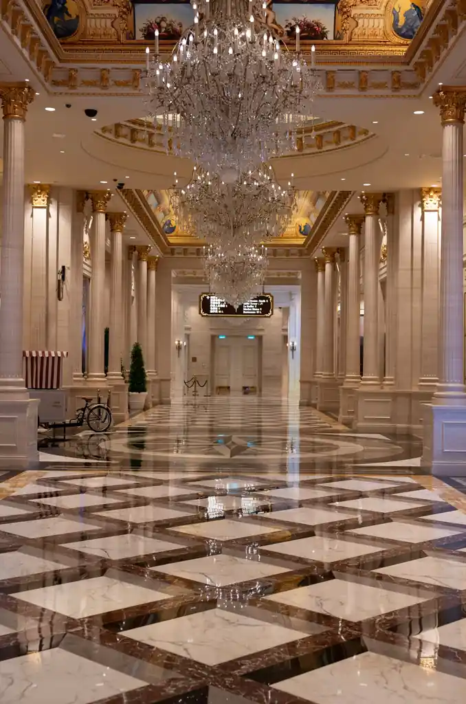 Opulent hotel lobby with chandeliers
